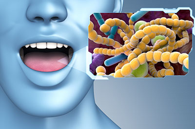 The image shows a three-dimensional rendering of a human face with an open mouth, set against a background of a microscopic view of bacteria, labeled with scientific terms such as  bacteria  and  antibiotic.